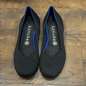 Rothy's Elegant Black Flats with Blue Trim